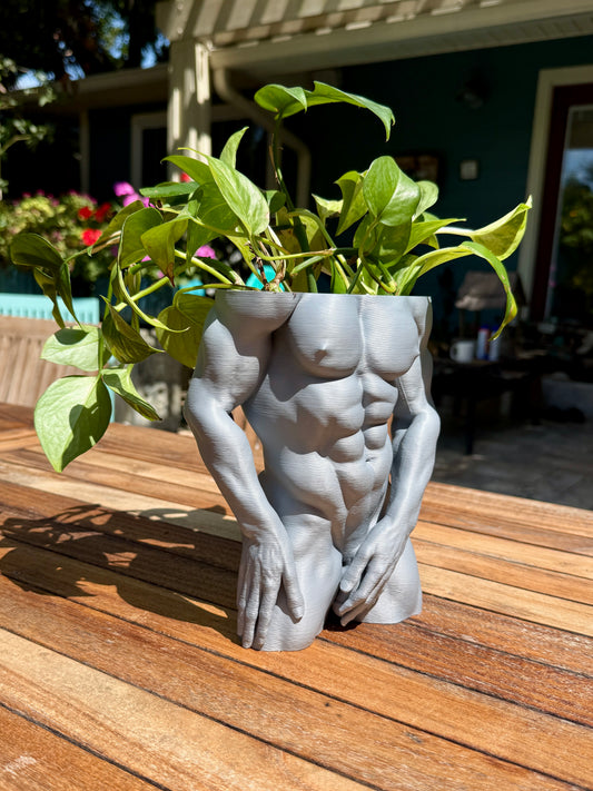 Water Me Daddy muscular male torso planter, side view