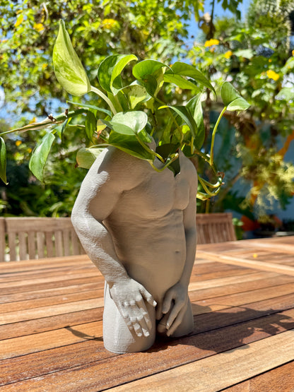 The Father Figure dad bod torso planter, back view