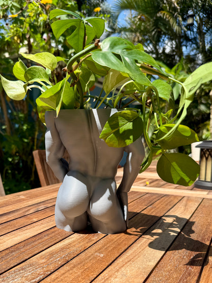 Water Me Daddy muscular male torso planter, angled view